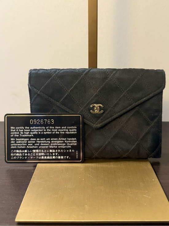 CHANEL Handbags - CHANEL Black Quilted Leather Zip Wallet with Authenticity Card